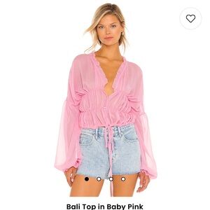 SNDY’s pink blouse